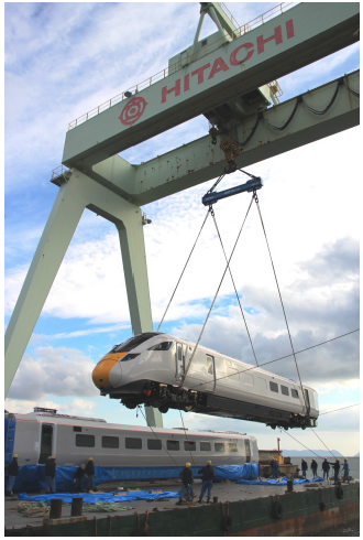 [image]A Class 800 train is being loaded for shipment