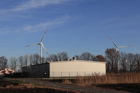[image]Figure 1. The hybrid BESS building installed next to the Bystra Wind Farm