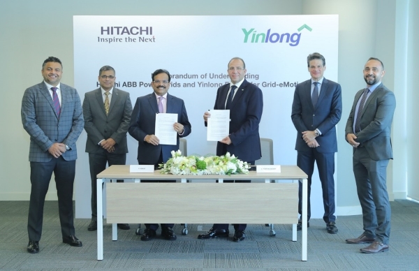 [image]Signing ceremony of the memorandum by Mostafa Al Guezeri, Managing Director Gulf, Near East & Pakistan, Hitachi ABB Power Grids (3rd from the right) and Venkat P., Managing Director, Yinlong Energy Middle East (4th from the right)