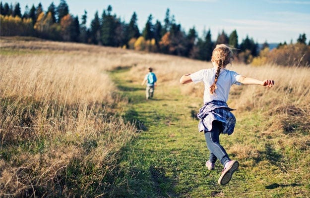 A person running through a field