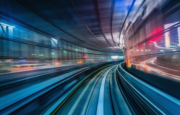 A tunnel or passageway with a strong sense of motion and perspective