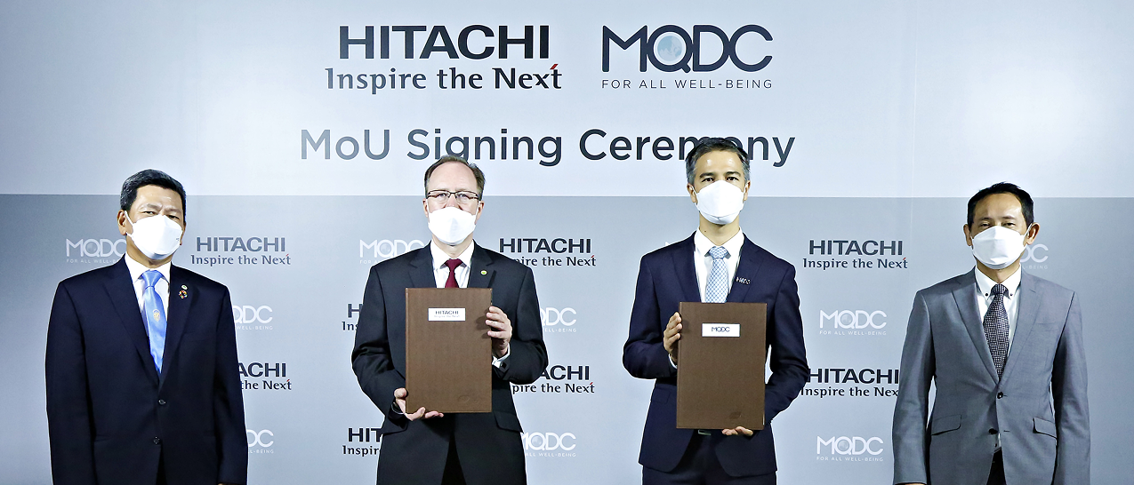 From left: Mr. Somsak Garnjanakarn, Executive Director and Chief Marketing Officer, Hitachi Asia (Thailand); Mr. Andrew Hamilton, General Manager – Smart Digital Solution Business Development (SDBD), Hitachi Asia (Thailand) & Head of SDBD Consulting Servi From left: Mr. Somsak Garnjanakarn, Executive Director and Chief Marketing Officer, Hitachi Asia (Thailand); Mr. Andrew Hamilton, General Manager – Smart Digital Solution Business Development (SDBD), Hitachi Asia (Thailand) & Head of SDBD Consulting Services ASEAN, Hitachi Asia; Mr. Kipsan Beck, President – Placemaking Business Unit, MQDC; Mr. Visit Malaisirirat, CEO, MQDC.