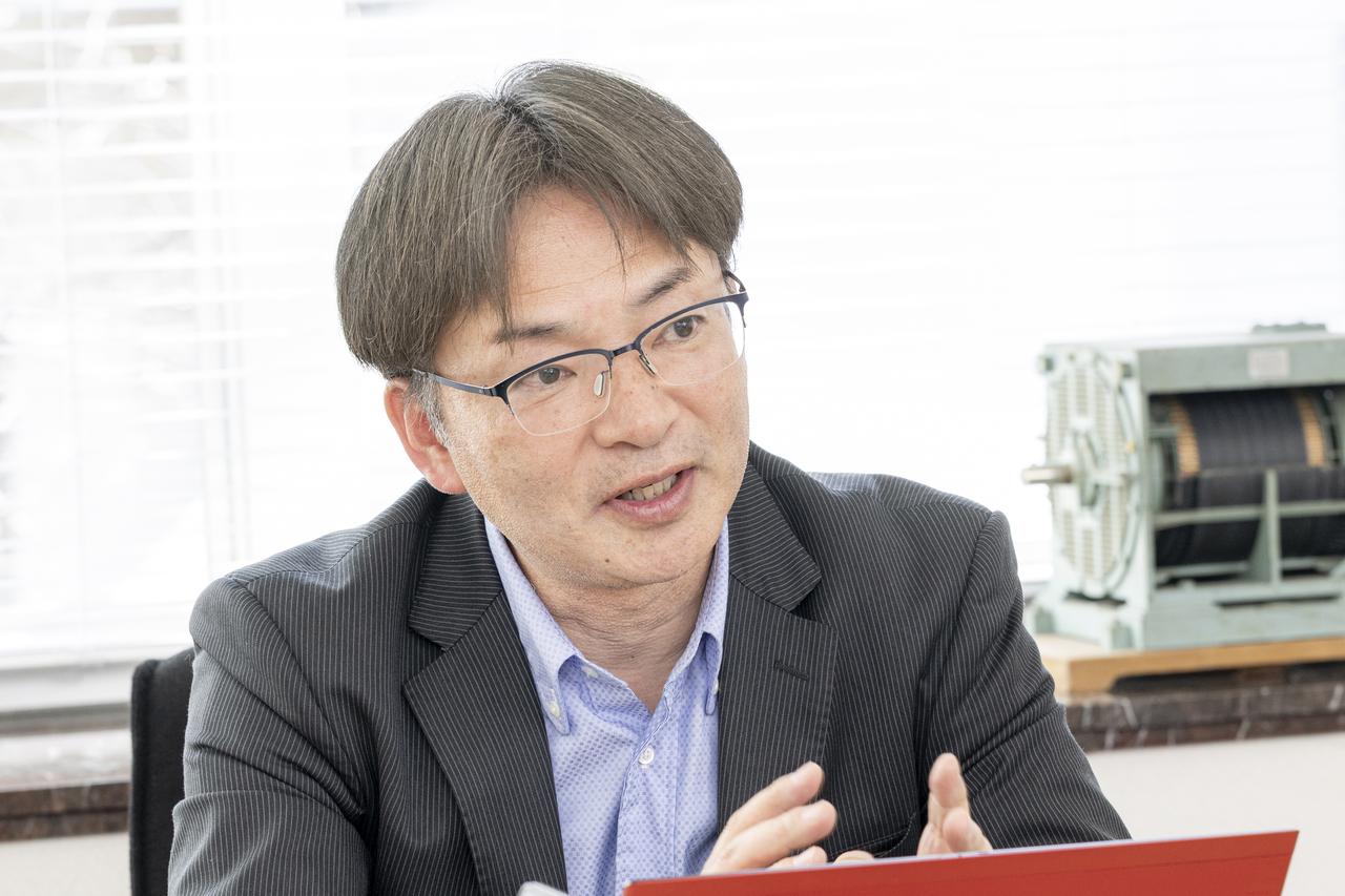 画像: 吉成良孝氏（日立インダストリアルプロダクツ 常務取締役 電機システム事業部 事業部長