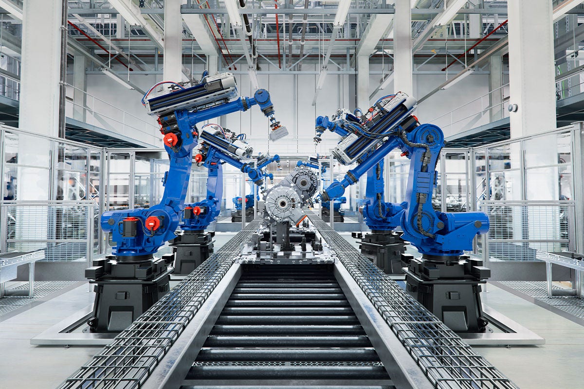 Blue Hitachi automated industrial robots in production 