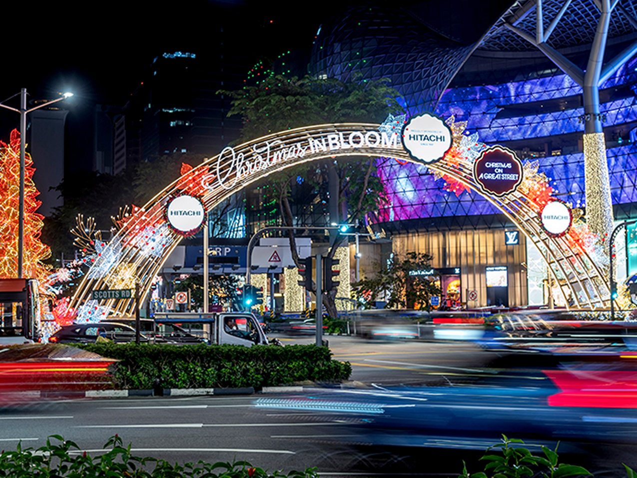 Photo of the main arch at the Scotts-Paterson Road junctions features a burst of colourful lights accented by red and rose gold poinsettias, a traditional Christmas flower that symbolises purity and mirth. (Photo Credit: Orchard Road Business Association)