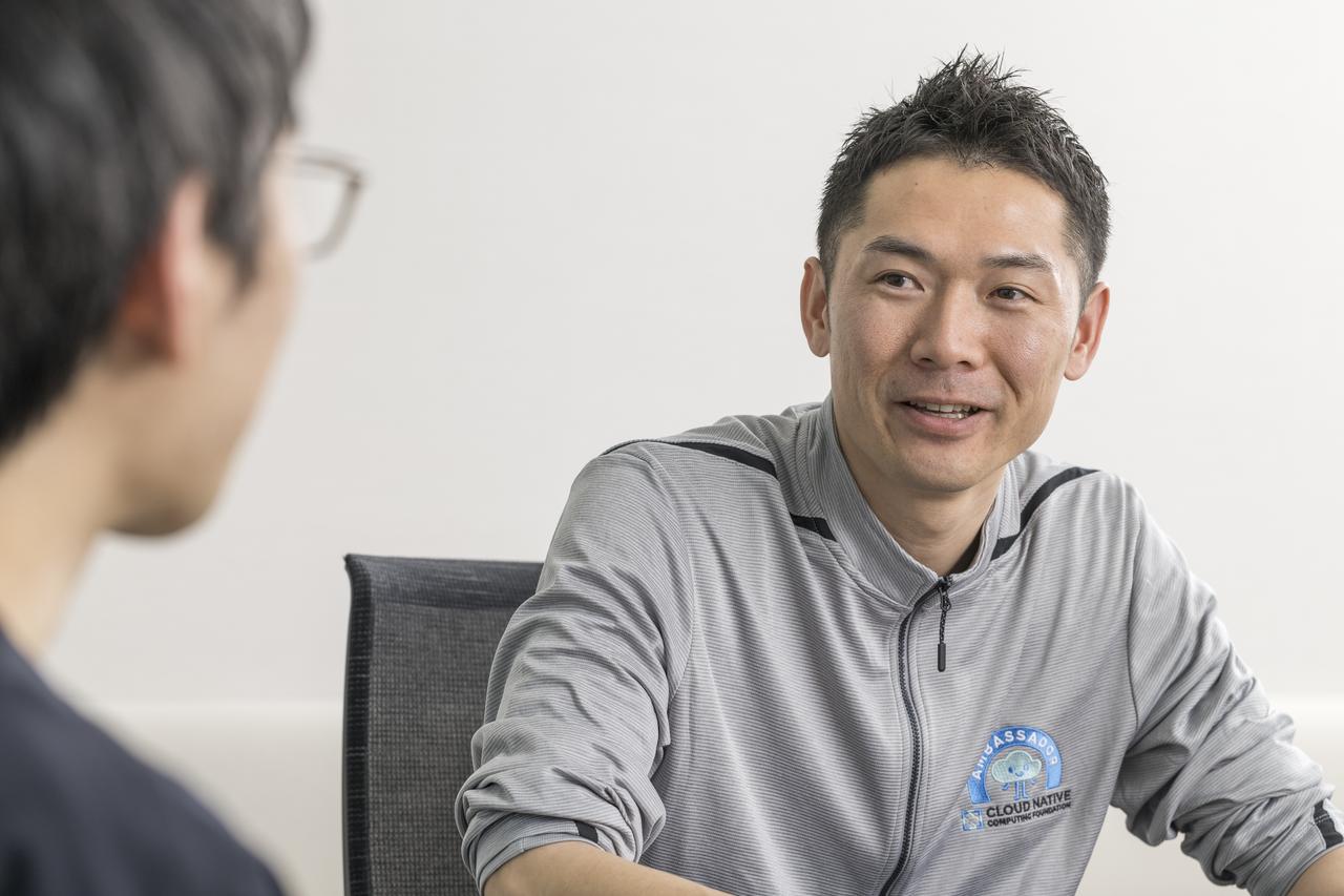 画像: 田畑義之氏（Cloud Native Computing Foundation AMBASSADORS、日立製作所 クラウドサービスプラットフォームビジネスユニット マネージド＆プラットフォームサービス事業部 ソフトウェアエンジニアリングCoE OSSソリューションセンタ シニアOSSコンサルタント）