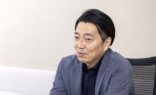 画像: 五十嵐聡氏（日立製作所 アプリケーションサービス事業部 Lumada共通技術開発本部 生成AI技術開発部 部長）