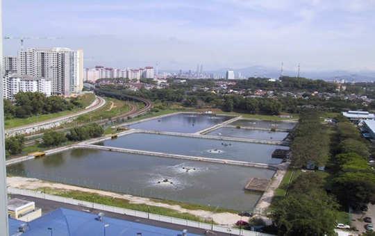 Photograph: [Before construction/existing: Oxidation Pond]