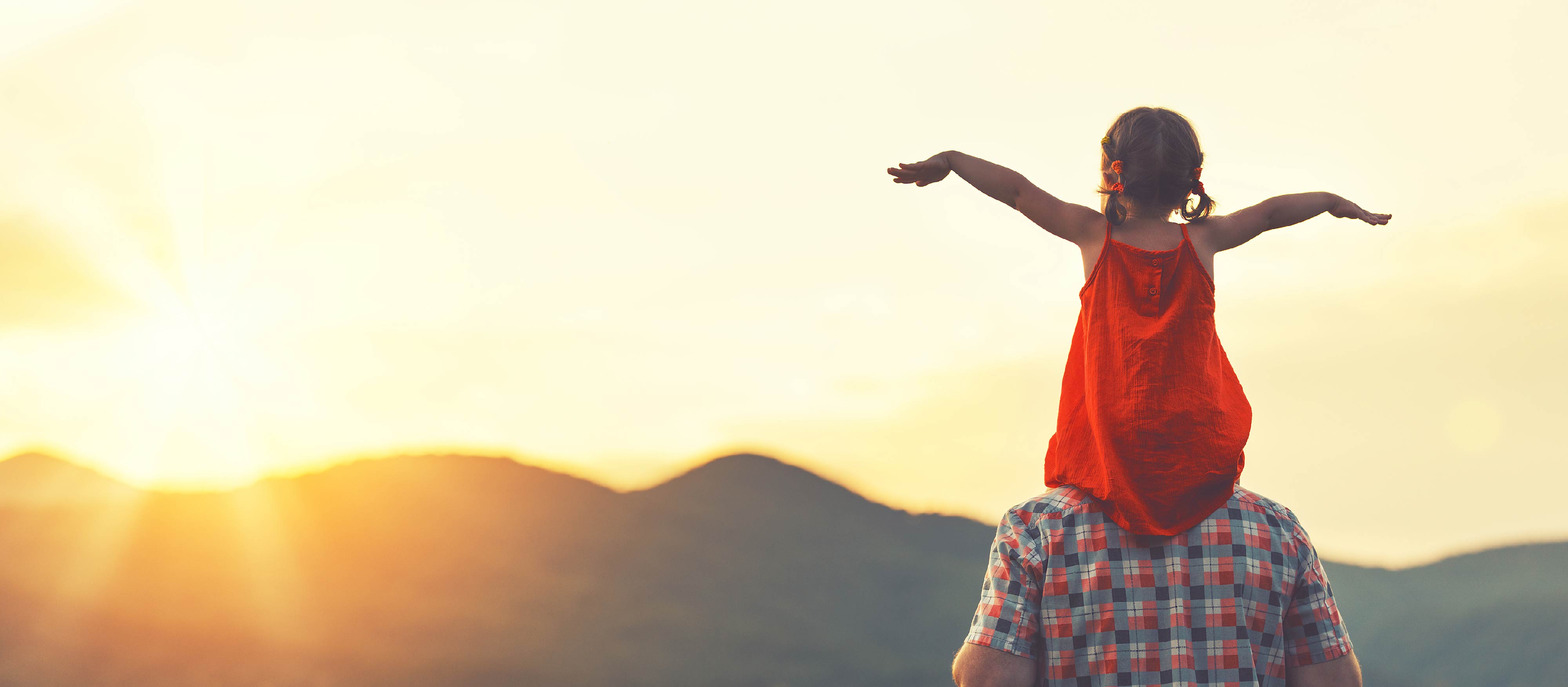 Girl enjoying a sunrise