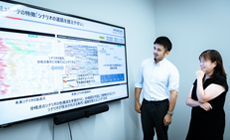 Making use of a decarbonization scenario simulator in collaborative creation with municipalities to holistically balance the local environment, economy, and well-being